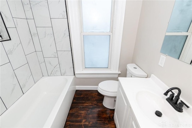 bathroom with hardwood / wood-style floors, toilet, and vanity