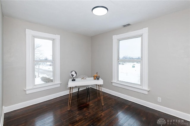 office space with hardwood / wood-style floors