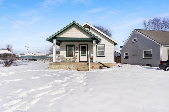 bungalow-style home with a porch