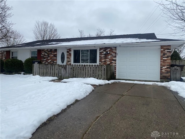 single story home with a garage