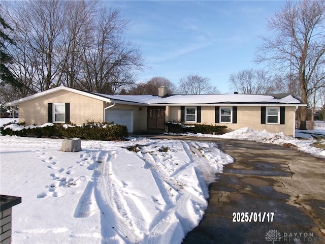 ranch-style house with a garage