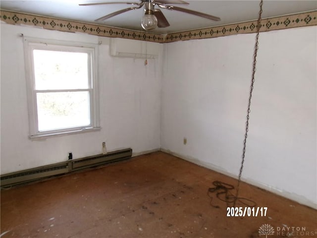 unfurnished room with ceiling fan and a baseboard radiator