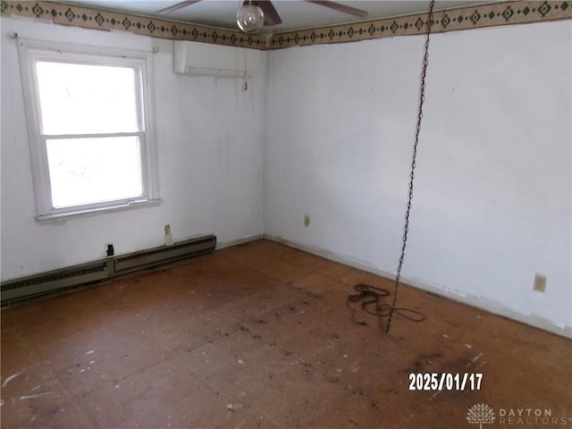 unfurnished room featuring an AC wall unit and a baseboard heating unit