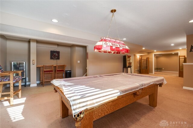 playroom with light carpet, indoor bar, and billiards