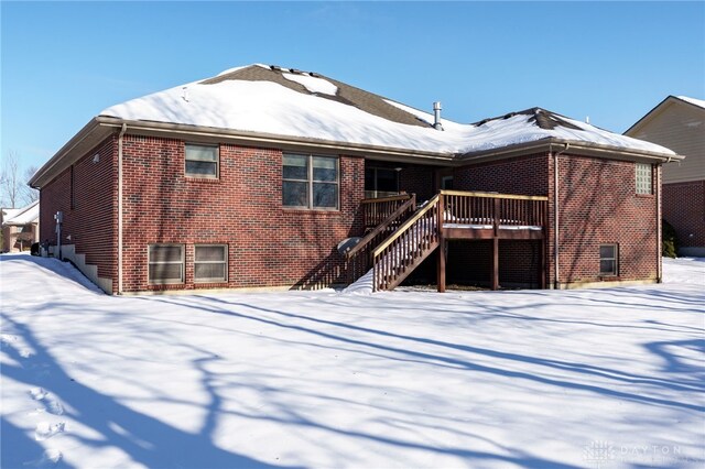 view of snow covered property