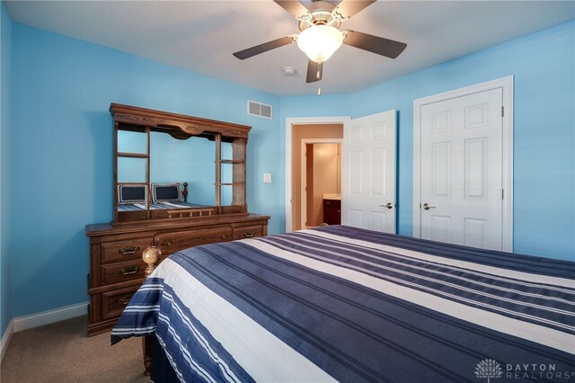 bedroom featuring ceiling fan and carpet