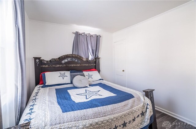 bedroom featuring hardwood / wood-style flooring