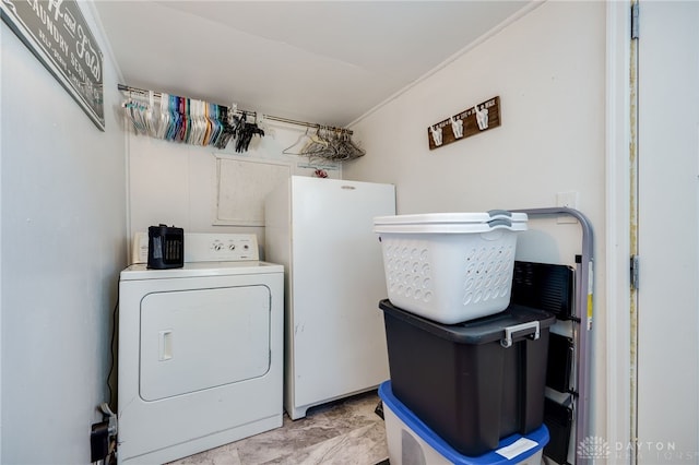 washroom with washer / clothes dryer