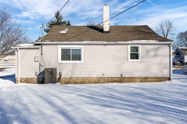 view of snow covered house