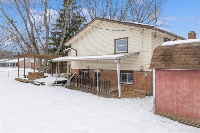 view of snow covered property