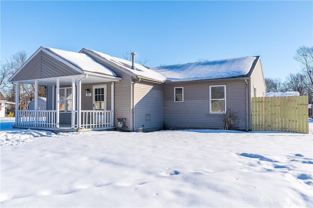 view of front of property featuring covered porch