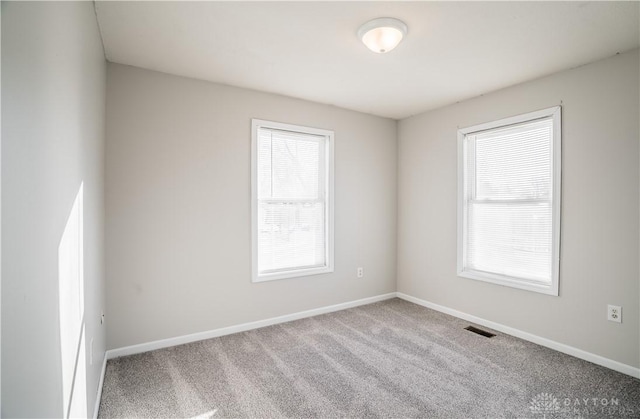 view of carpeted spare room