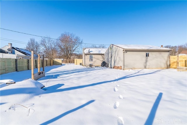 view of yard covered in snow