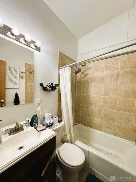 full bathroom with toilet, shower / bath combination with curtain, and vanity