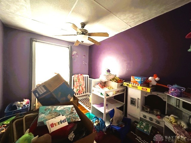 bedroom featuring ceiling fan