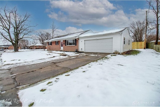 single story home with a garage