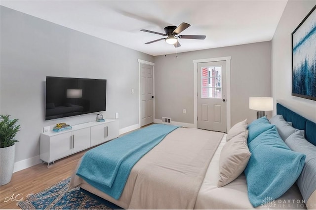 bedroom featuring ceiling fan and light hardwood / wood-style floors