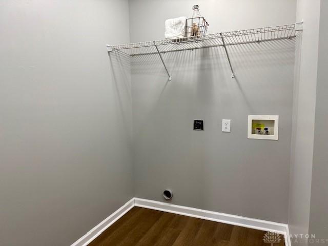 laundry area with hardwood / wood-style flooring, washer hookup, and hookup for an electric dryer