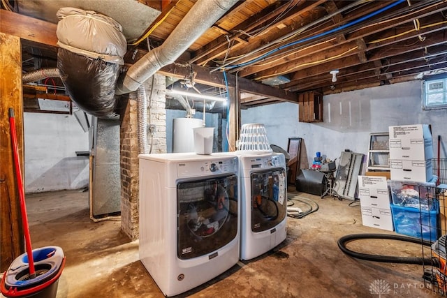 laundry area featuring separate washer and dryer and gas water heater