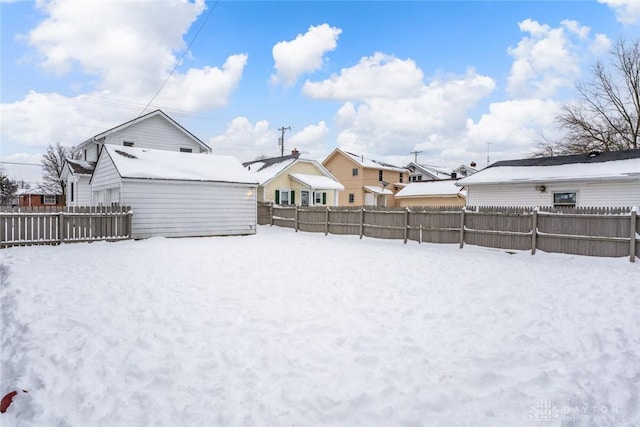 view of yard covered in snow