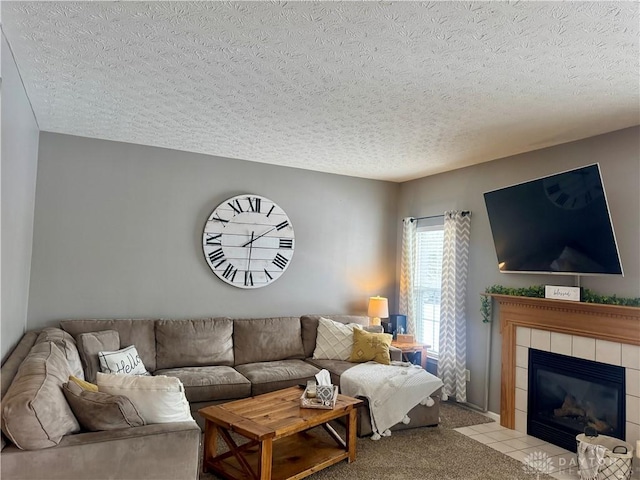 carpeted living room with a textured ceiling and a fireplace