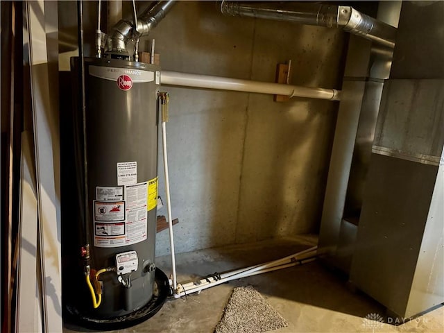 utility room with water heater