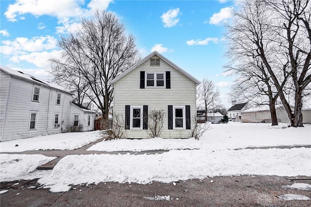 view of snow covered house