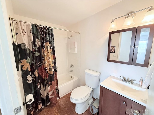 full bathroom featuring toilet, french doors, wood finished floors, shower / bath combination with curtain, and vanity