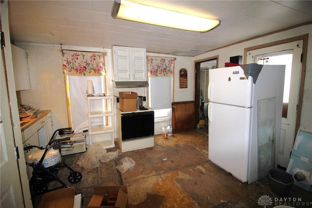 kitchen featuring white fridge