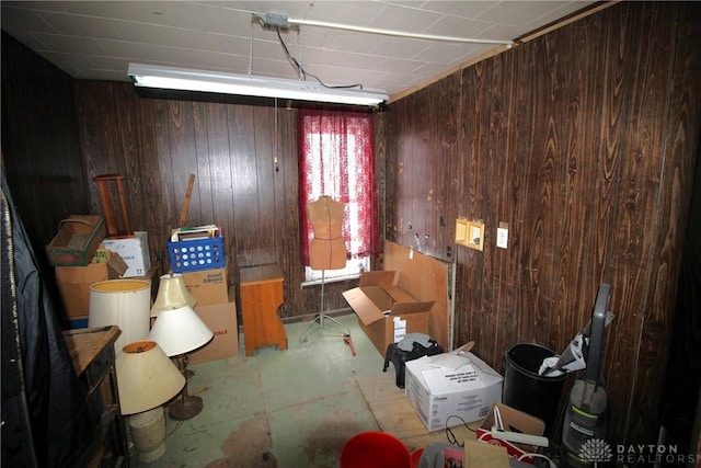 miscellaneous room with wood walls