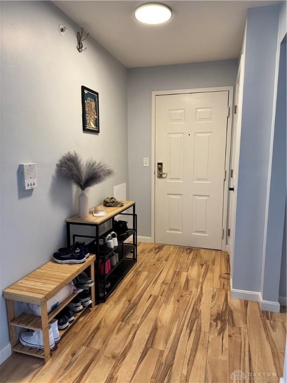 entryway with light hardwood / wood-style flooring