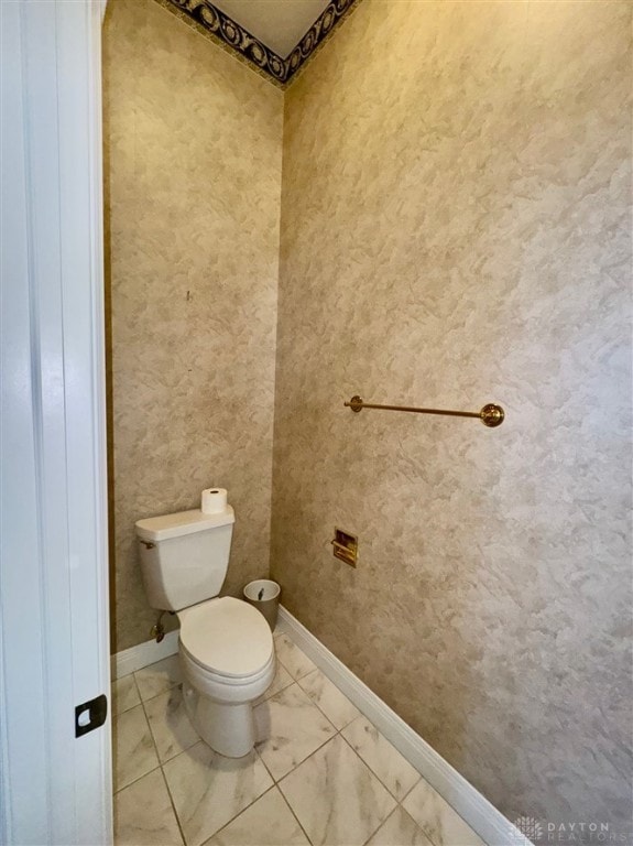 bathroom featuring toilet