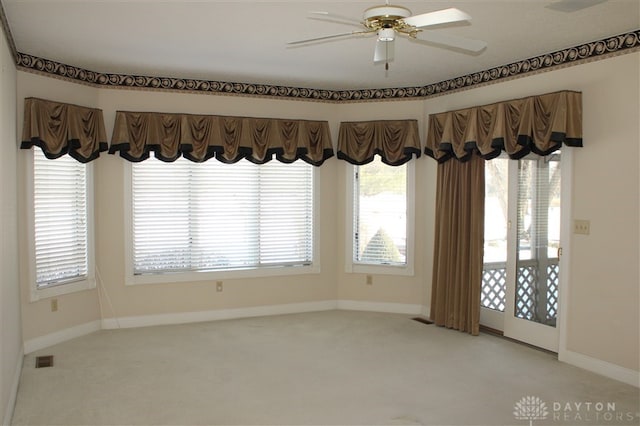 spare room with ceiling fan