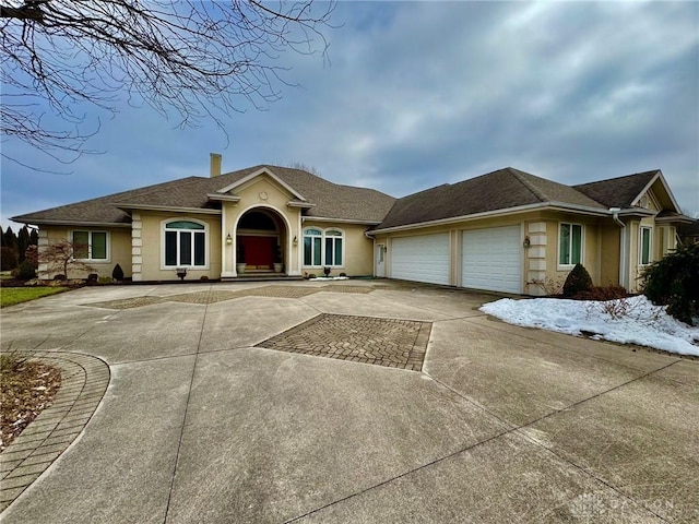 ranch-style home with a garage