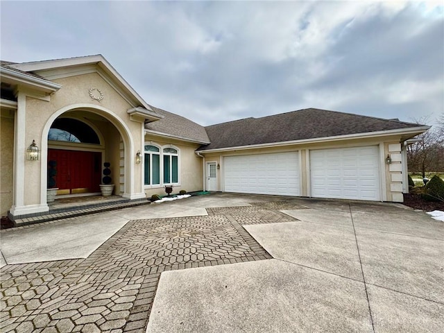 view of front of home featuring a garage