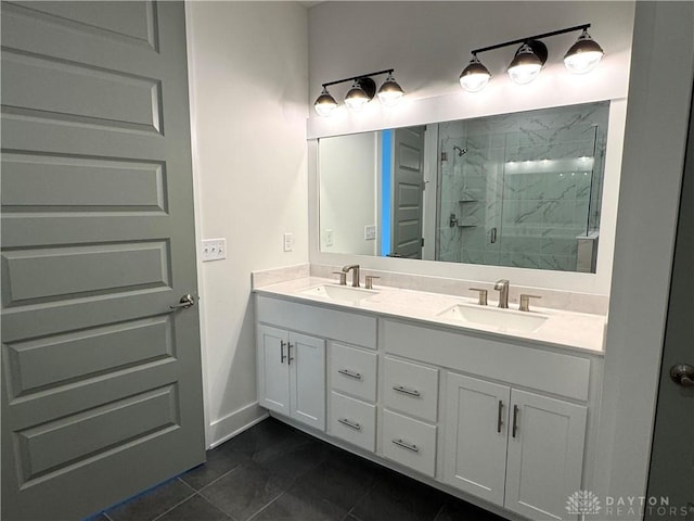 bathroom with vanity, tile patterned flooring, and a shower with door