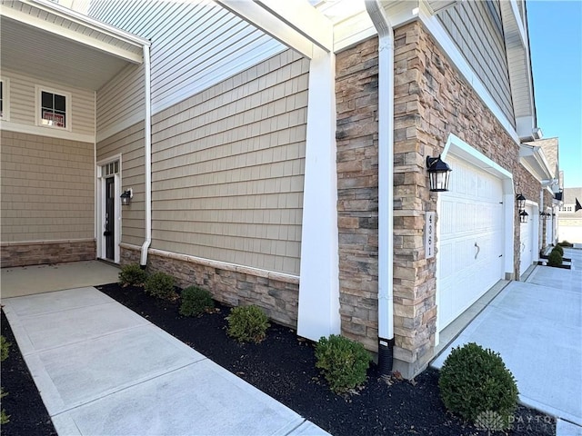 view of home's exterior with a garage