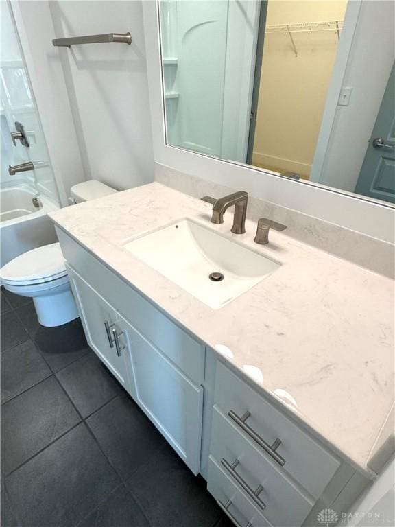 full bathroom featuring toilet, shower / tub combination, tile patterned floors, and vanity