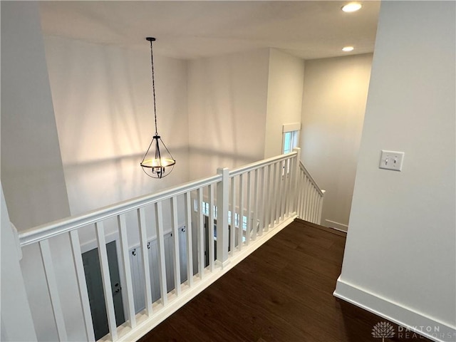 hall with dark hardwood / wood-style floors