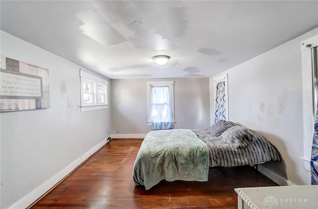 bedroom featuring dark hardwood / wood-style floors