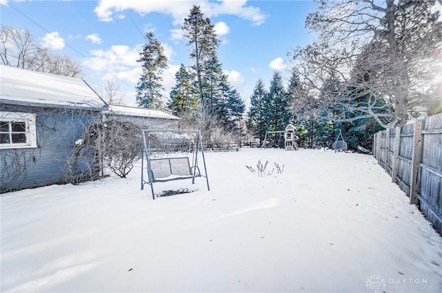 view of yard covered in snow