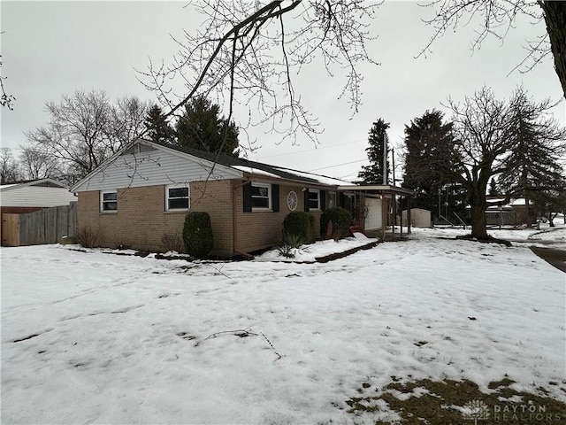 view of snow covered property