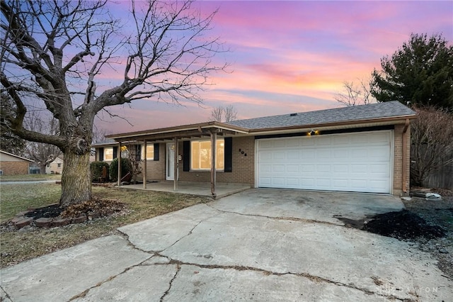 ranch-style home with a garage