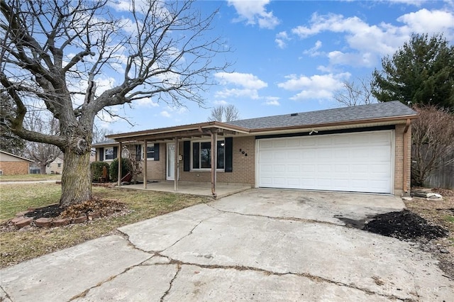 ranch-style home featuring a garage