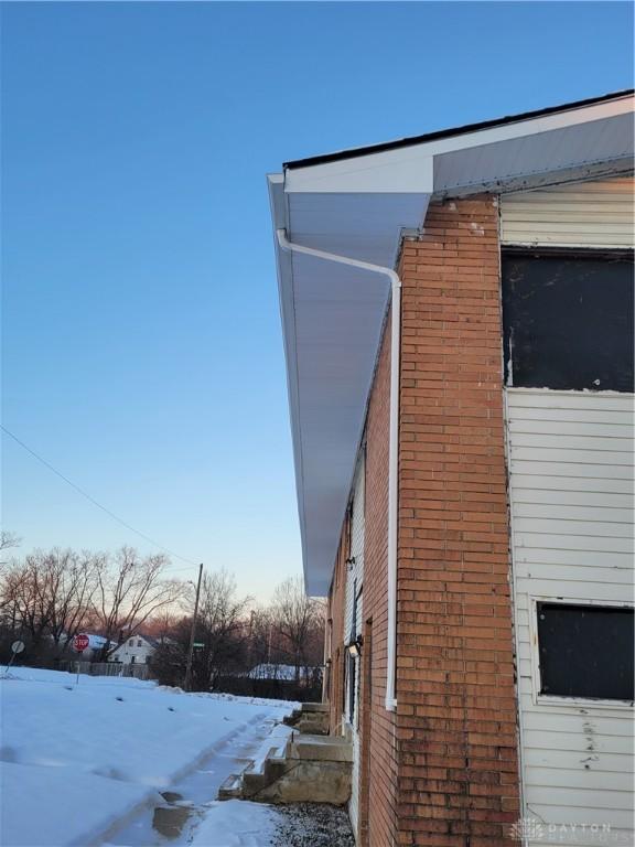 view of snow covered property