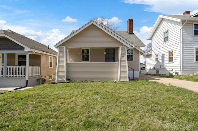 exterior space featuring a yard and a porch