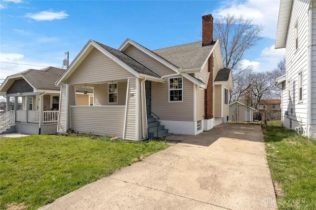 view of front of house with a front lawn and a porch