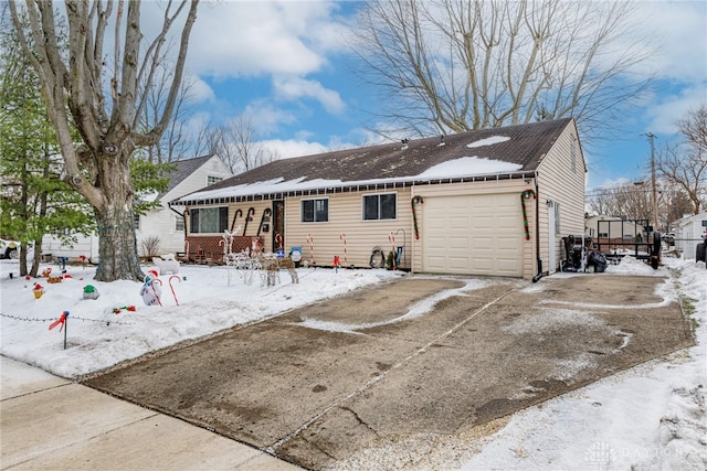 view of front of home featuring covered porch and a garage