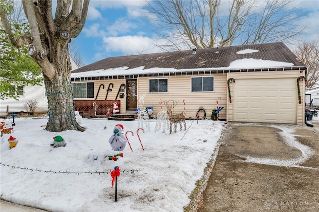 single story home with a garage