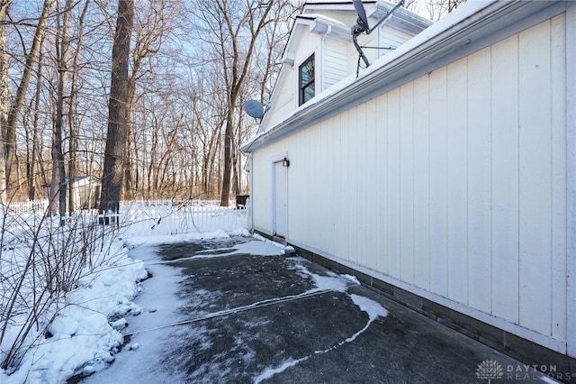 view of snow covered property